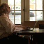 Jonathan Gold writing in a breakfast nook