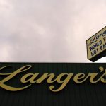 Sign above roof reading Langer's world famous hot pastrami