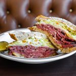 pastrami sandwich on a plate at Langer's Deli
